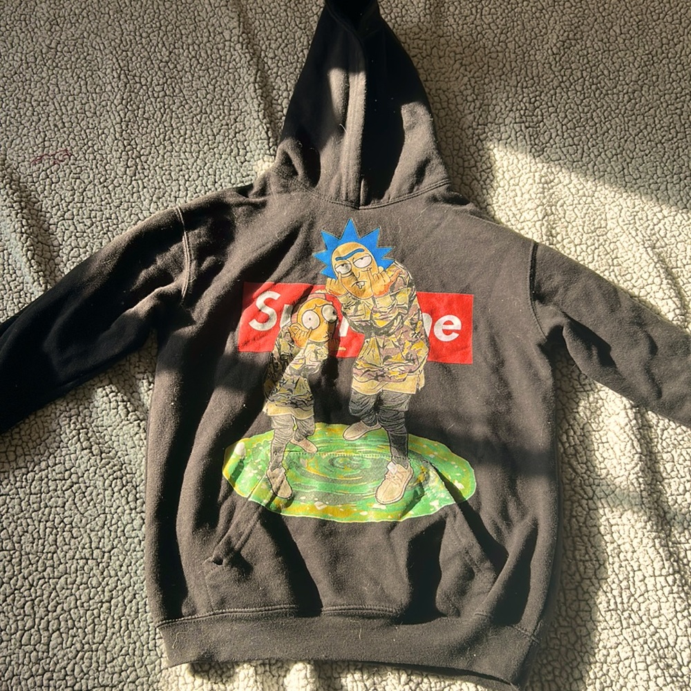 Supreme, Rick and Morty hoodie. I have cats lol that’s why there’s hair.